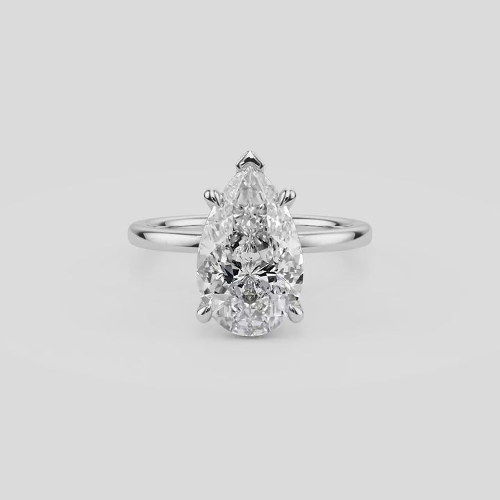Luminous Tear Solitaire Engagement - R1012