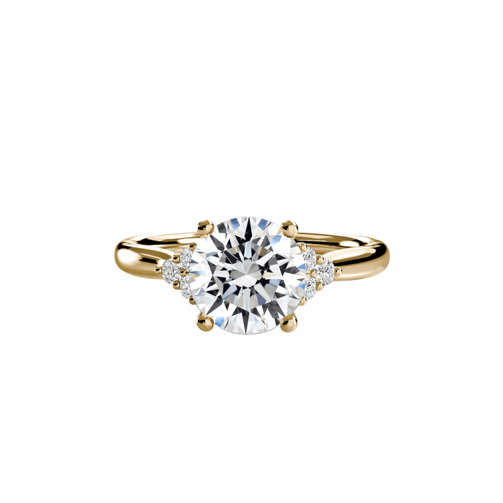 Solitaire With Cluster Shoulders in setting by 18 KARATS