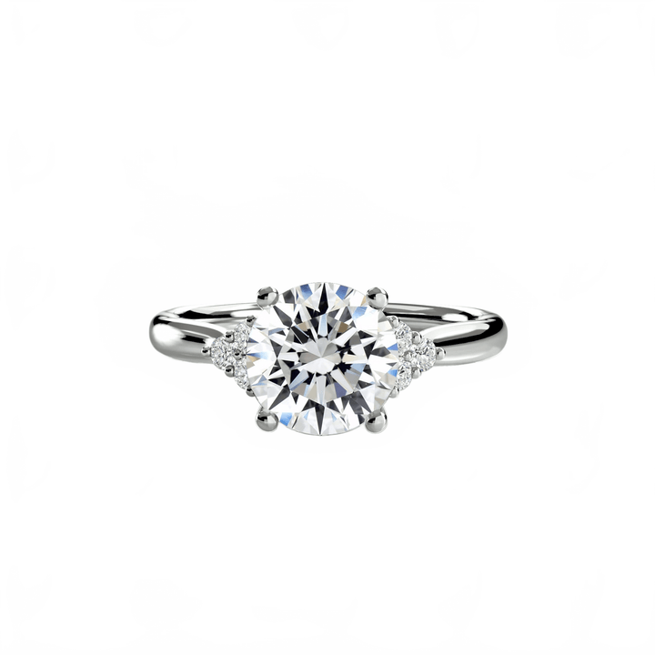 Solitaire With Cluster Shoulders in setting by 18 KARATS