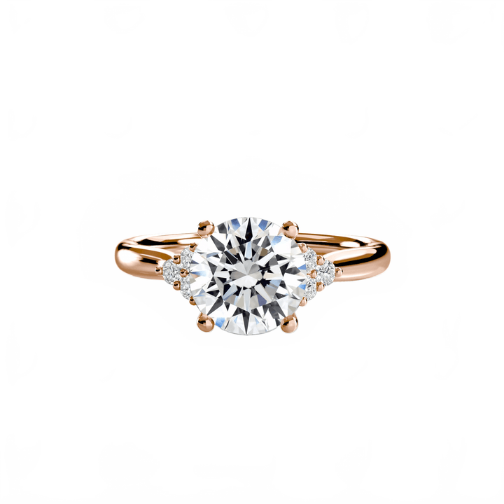 Solitaire With Cluster Shoulders in setting by 18 KARATS