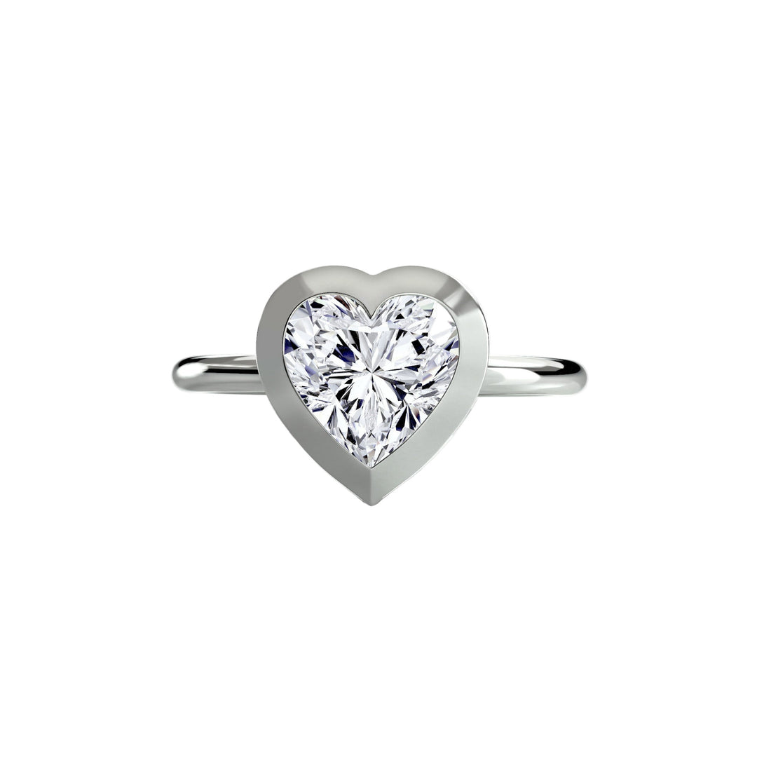 The Bezel Set Solitaire in setting by 18 KARATS