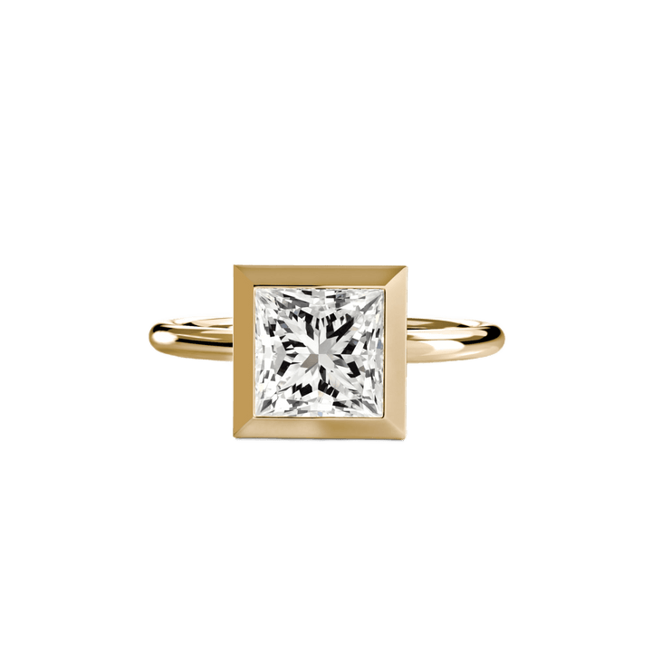 The Bezel Set Solitaire in setting by 18 KARATS
