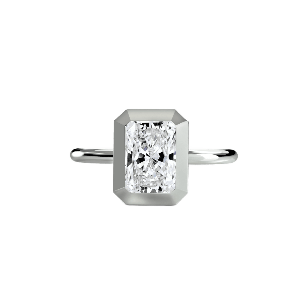 The Bezel Set Solitaire in setting by 18 KARATS