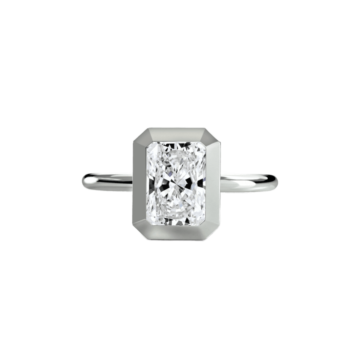 The Bezel Set Solitaire in setting by 18 KARATS