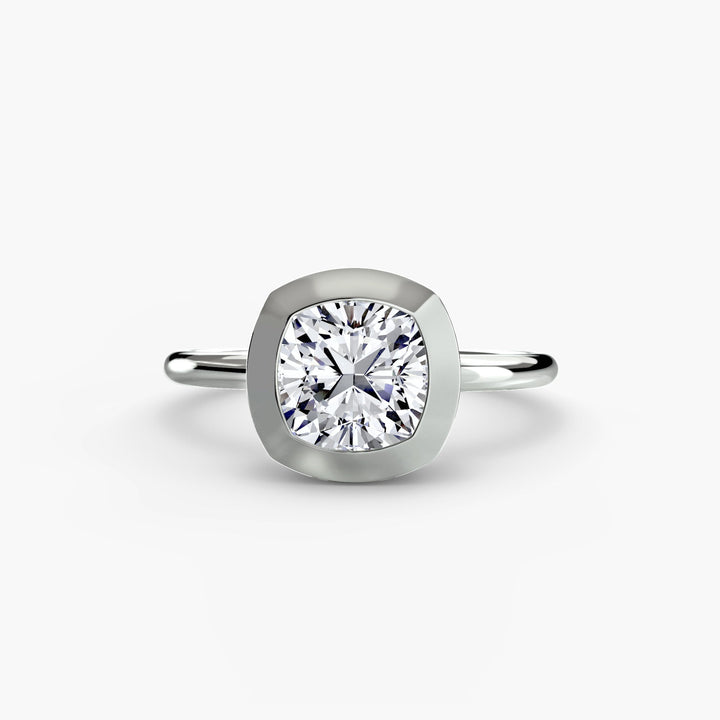 The Bezel Set Solitaire in setting by 18 KARATS