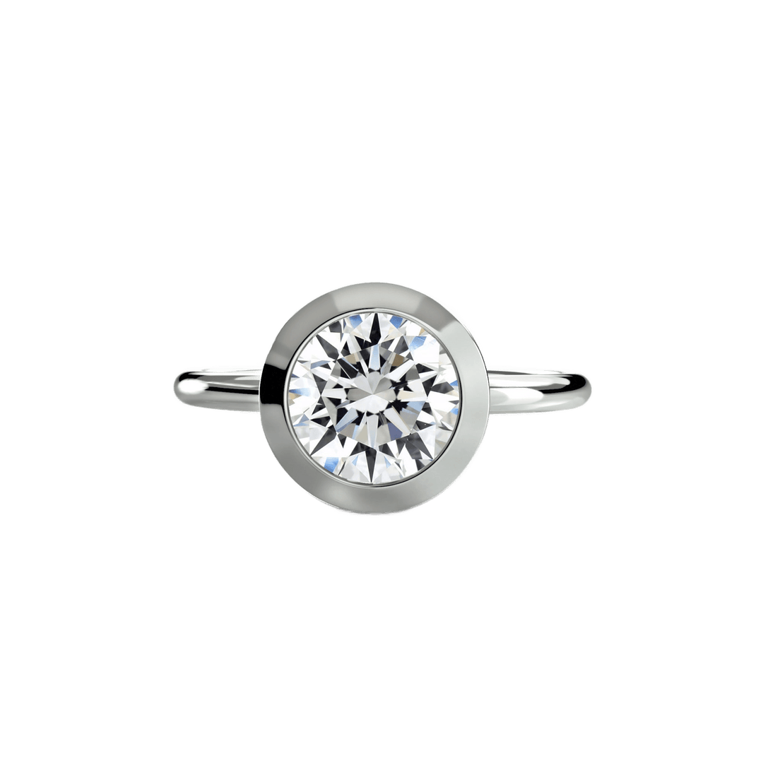 The Bezel Set Solitaire in setting by 18 KARATS