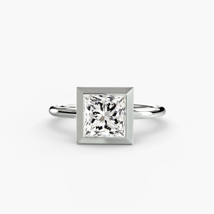 The Bezel Set Solitaire in setting by 18 KARATS