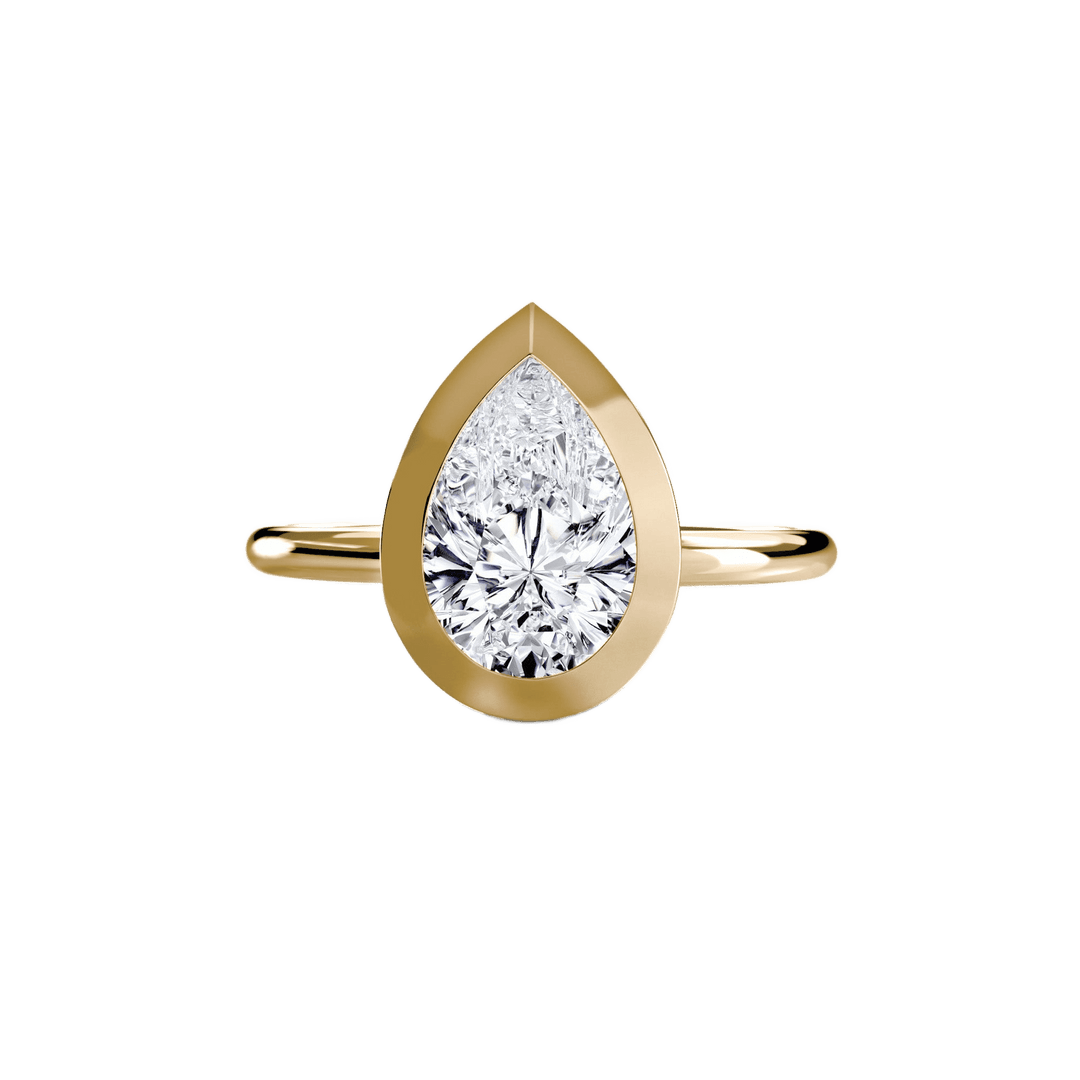 The Bezel Set Solitaire in setting by 18 KARATS