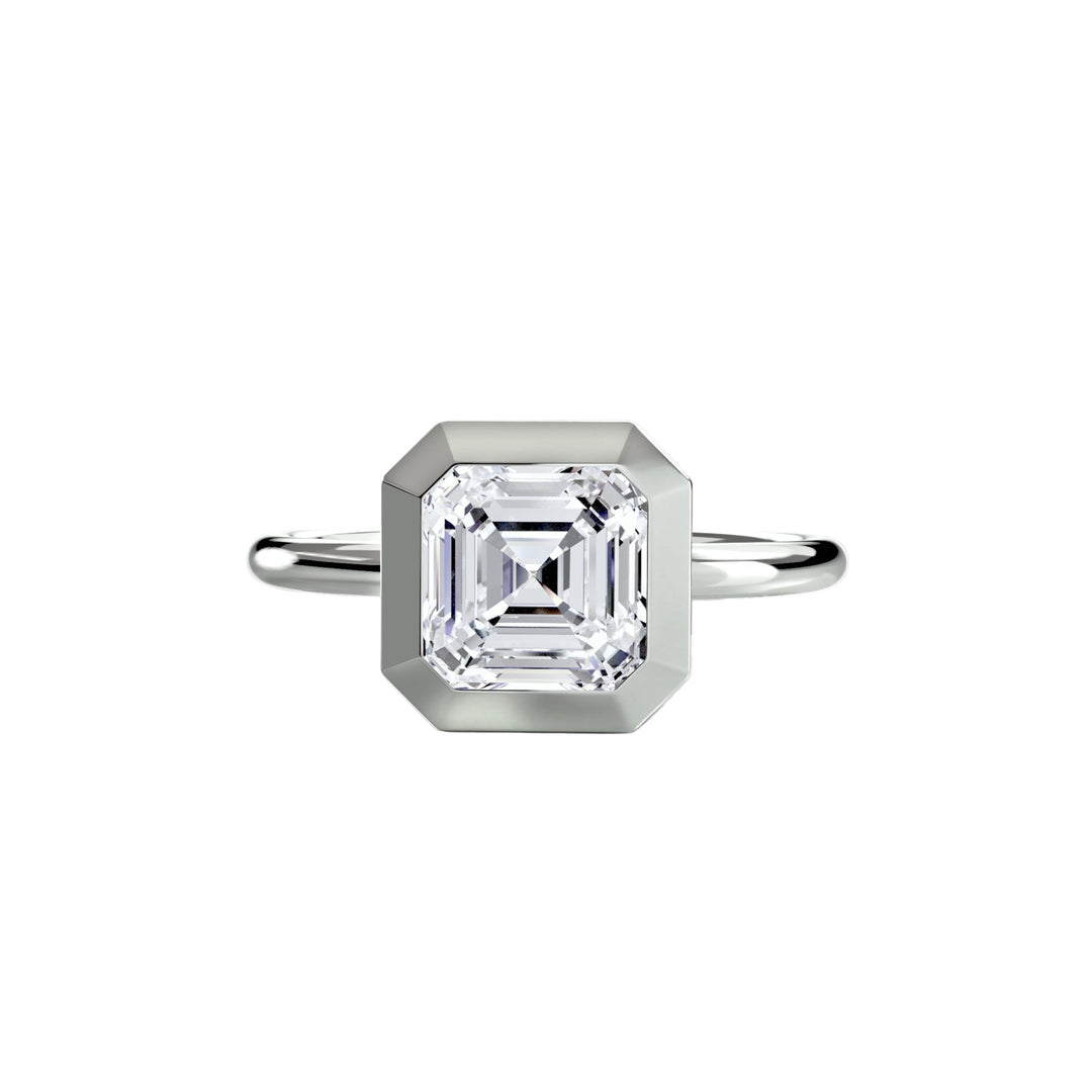 The Bezel Set Solitaire in setting by 18 KARATS
