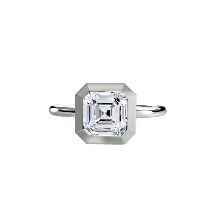 The Bezel Set Solitaire in setting by 18 KARATS