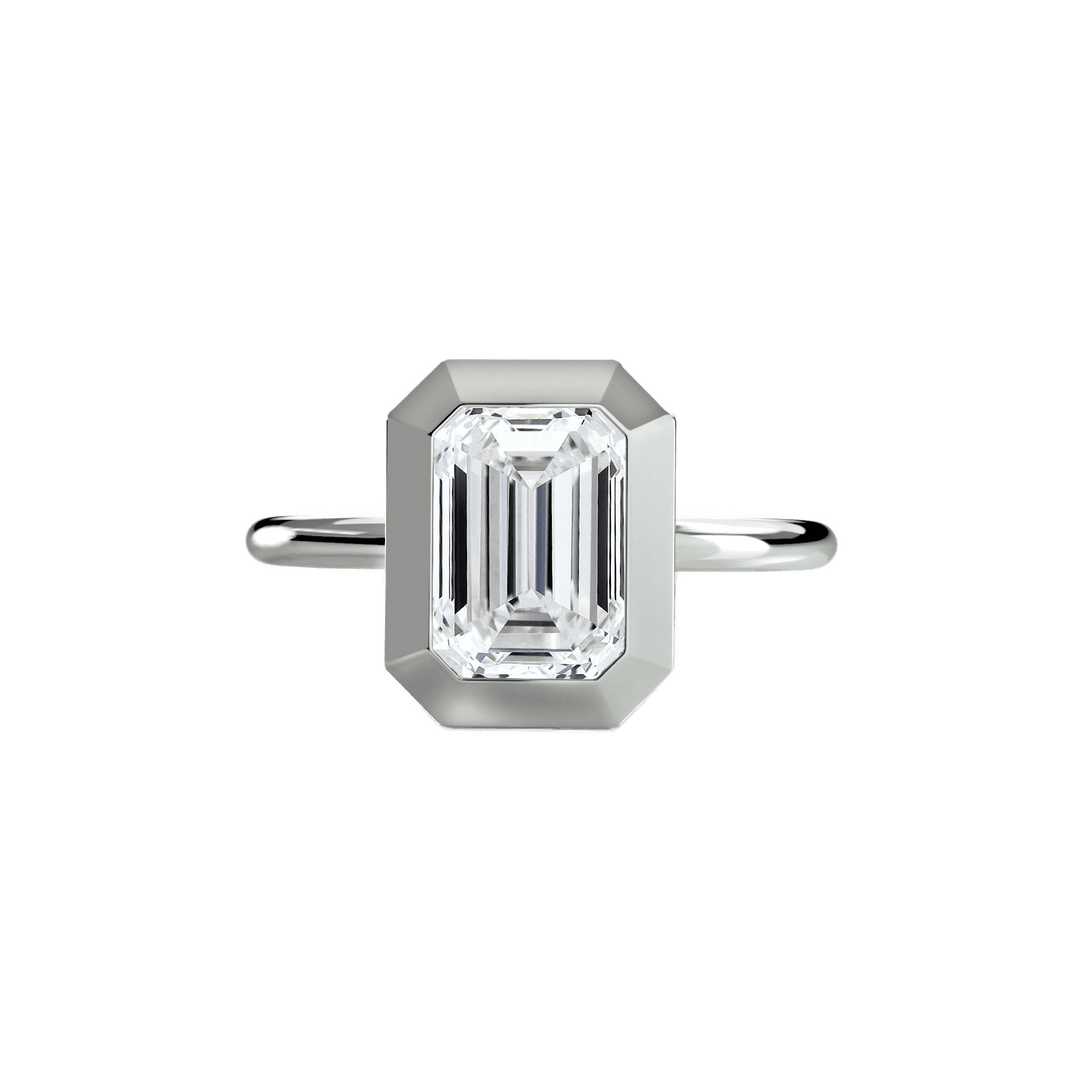 The Bezel Set Solitaire in setting by 18 KARATS