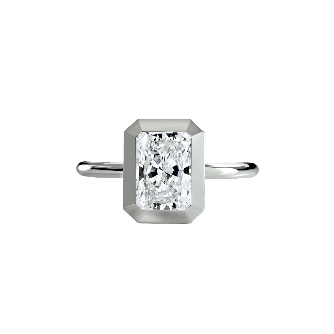 The Bezel Set Solitaire in setting by 18 KARATS