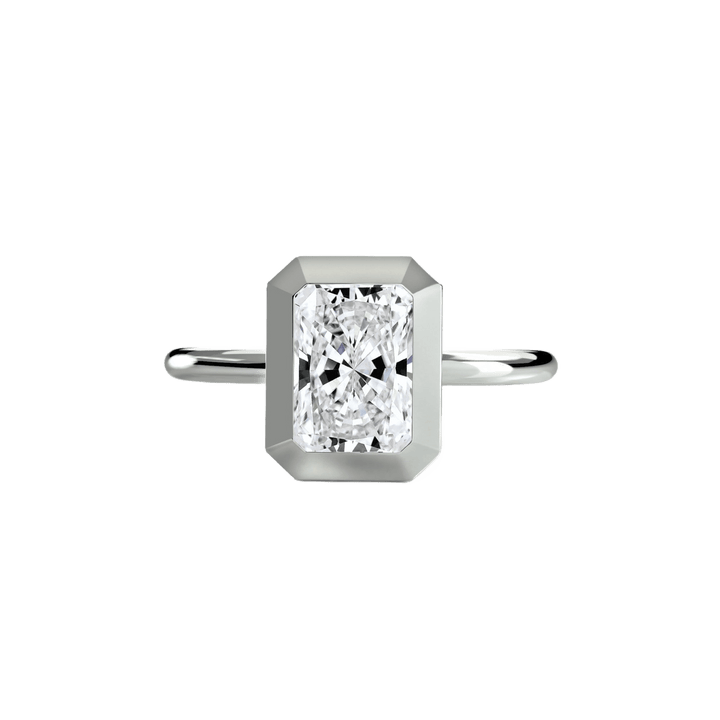 The Bezel Set Solitaire in setting by 18 KARATS