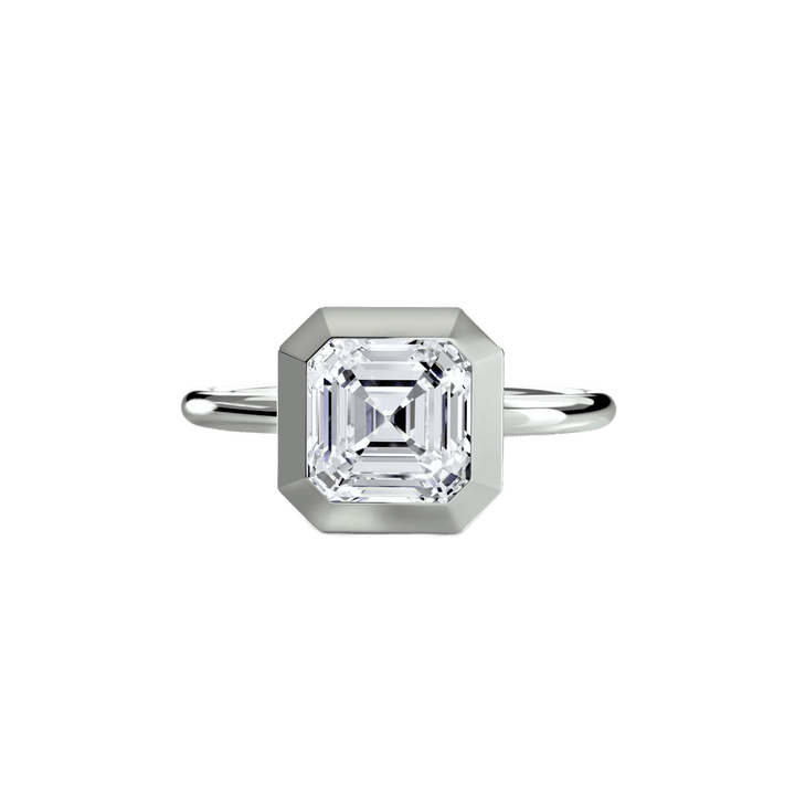 The Bezel Set Solitaire in setting by 18 KARATS