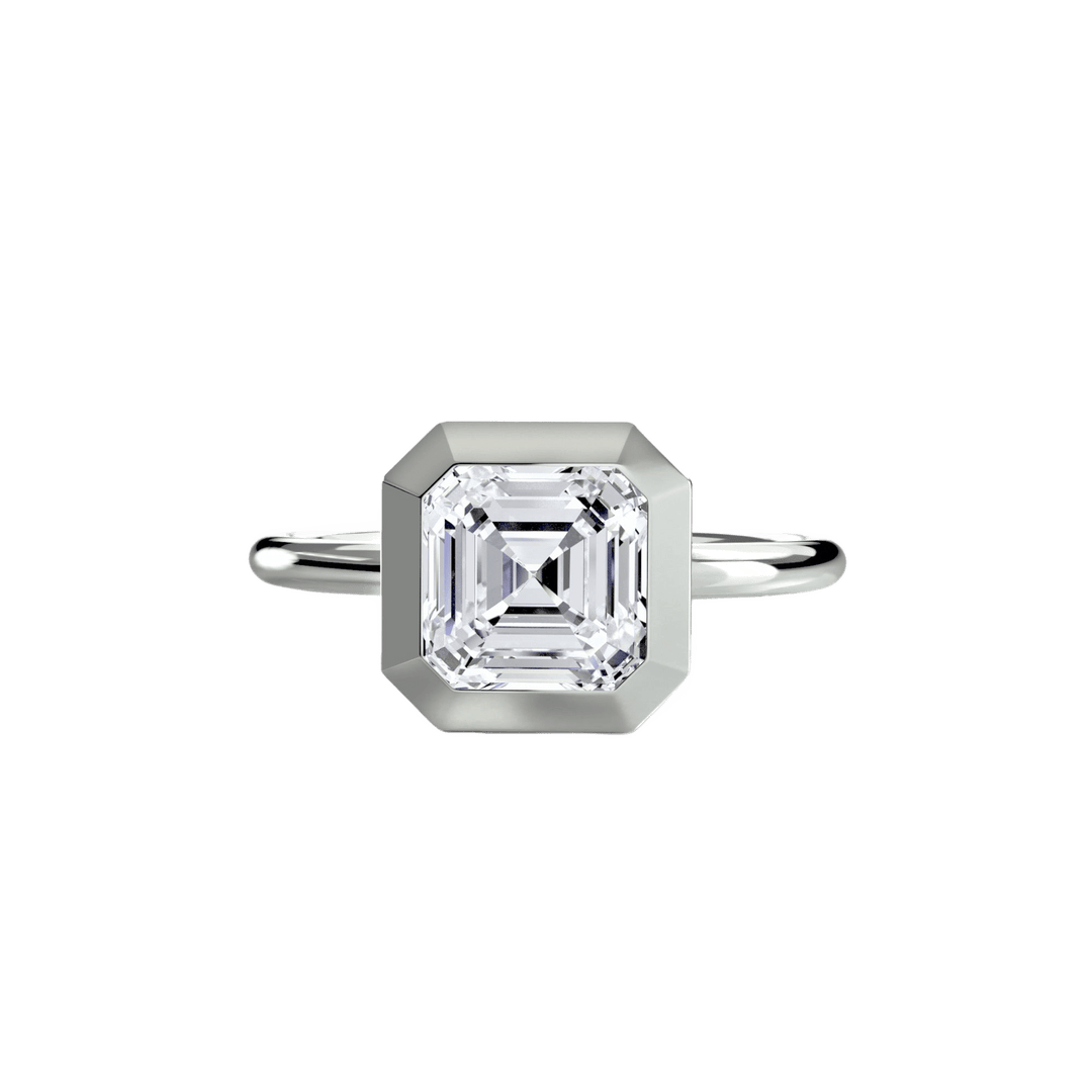 The Bezel Set Solitaire in setting by 18 KARATS