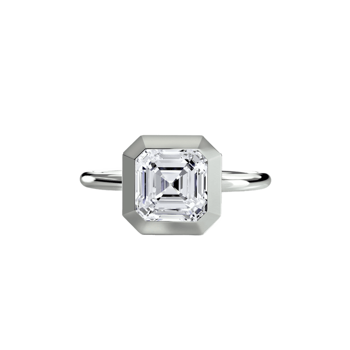 The Bezel Set Solitaire in setting by 18 KARATS