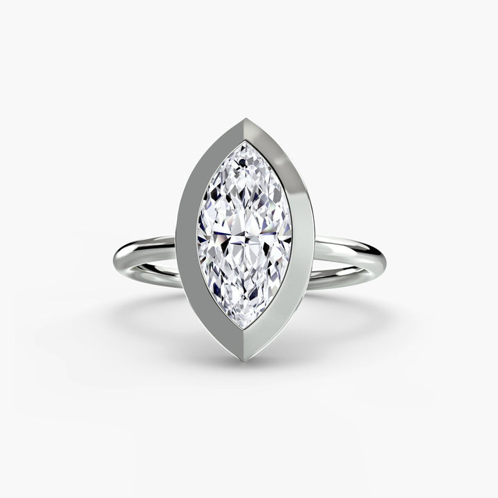The Bezel Set Solitaire in setting by 18 KARATS