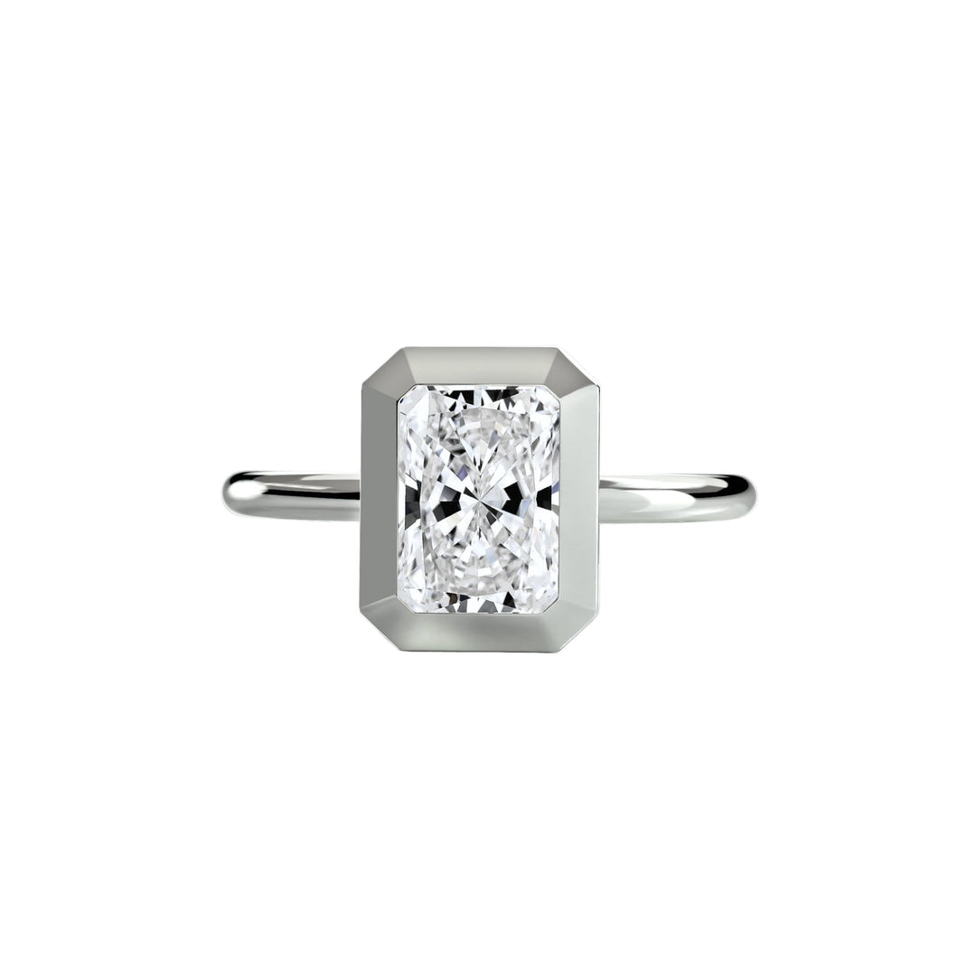 The Bezel Set Solitaire in setting by 18 KARATS