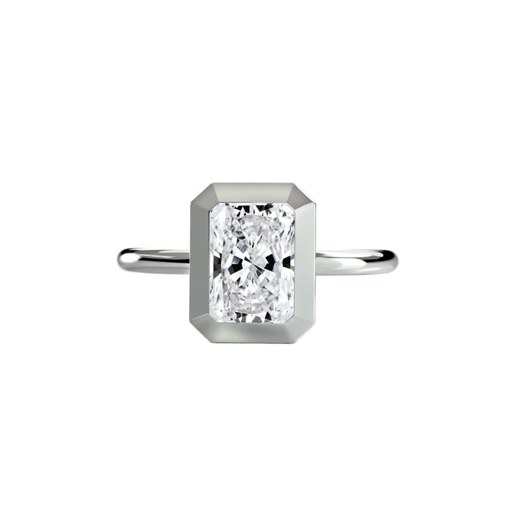 The Bezel Set Solitaire in setting by 18 KARATS