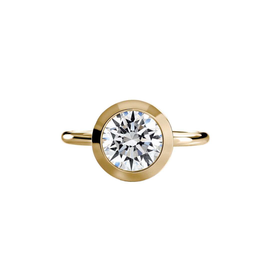 The Bezel Set Solitaire in setting by 18 KARATS
