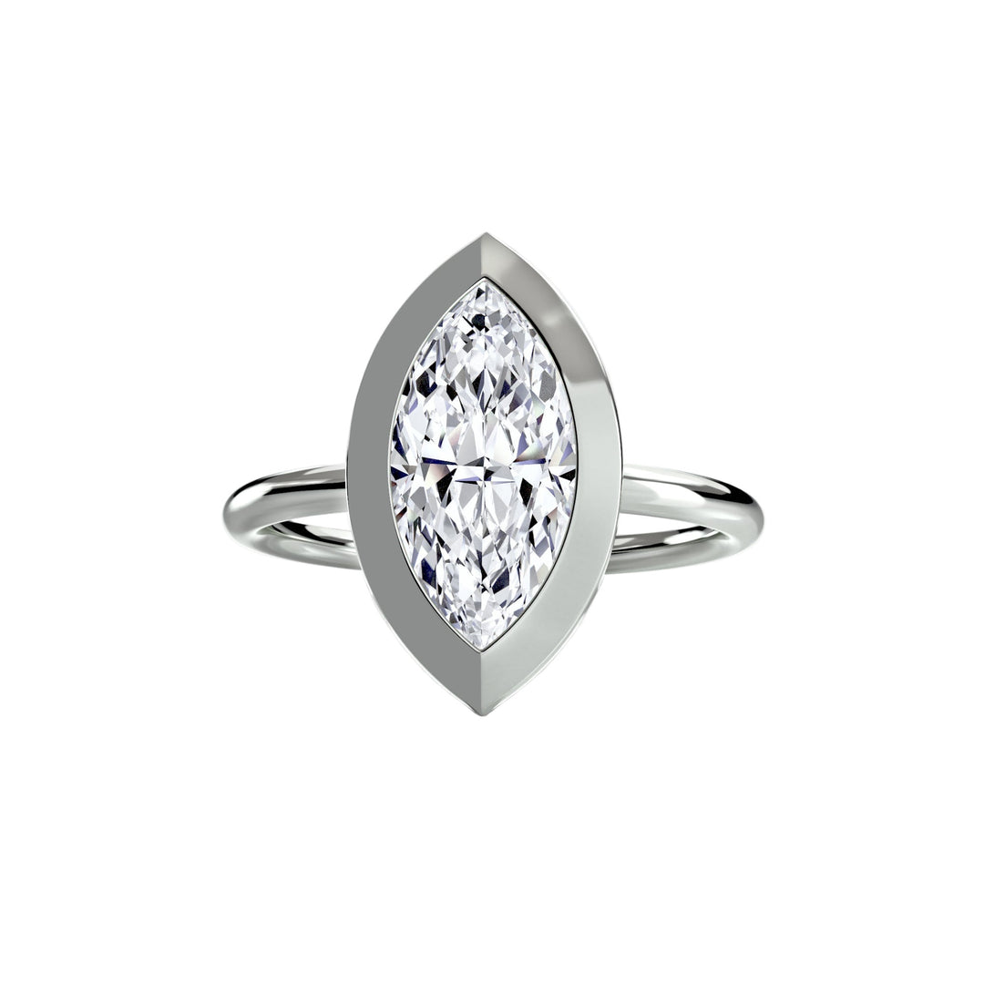 The Bezel Set Solitaire in setting by 18 KARATS