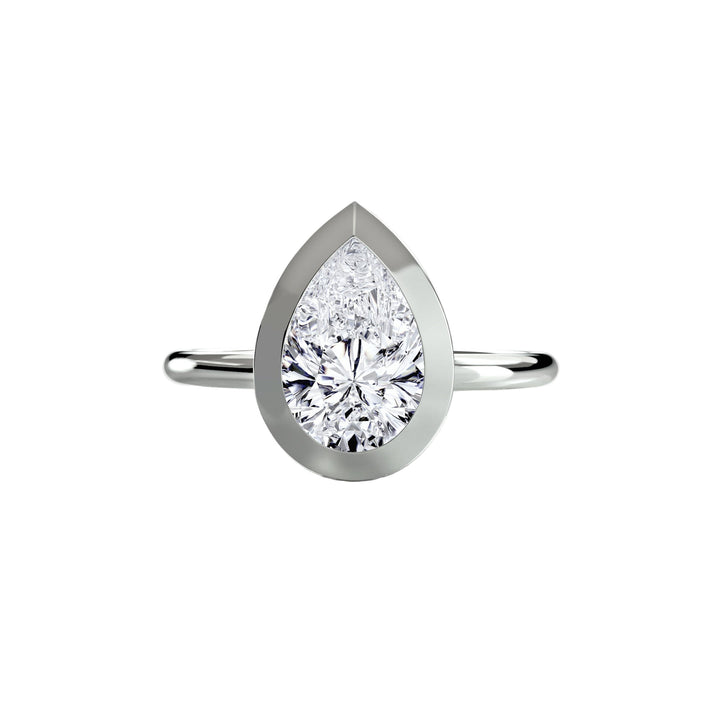 The Bezel Set Solitaire in setting by 18 KARATS