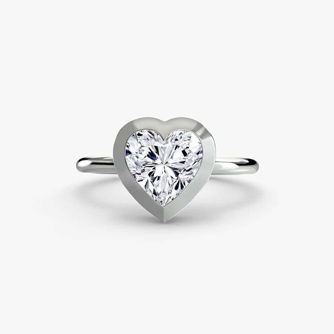 The Bezel Set Solitaire in setting by 18 KARATS