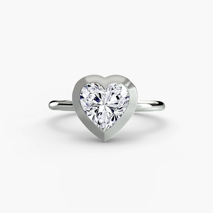 The Bezel Set Solitaire in setting by 18 KARATS