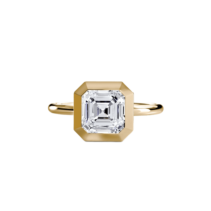 The Bezel Set Solitaire in setting by 18 KARATS