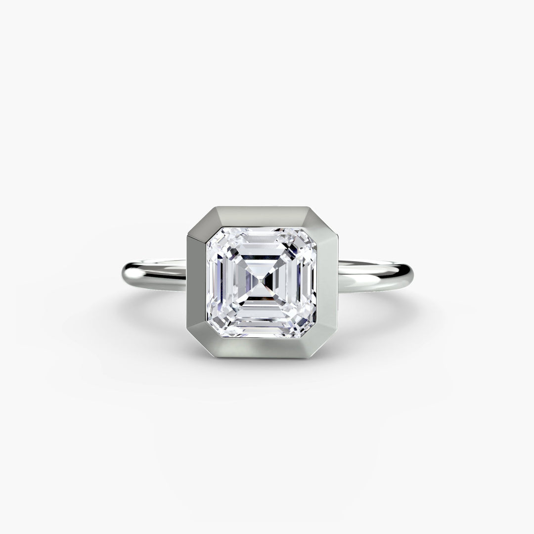 The Bezel Set Solitaire in setting by 18 KARATS
