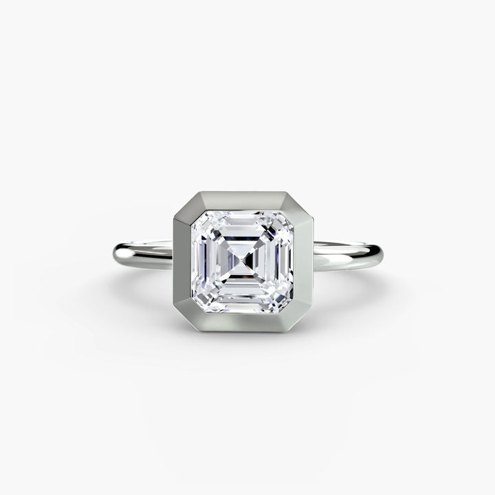 The Bezel Set Solitaire in setting by 18 KARATS