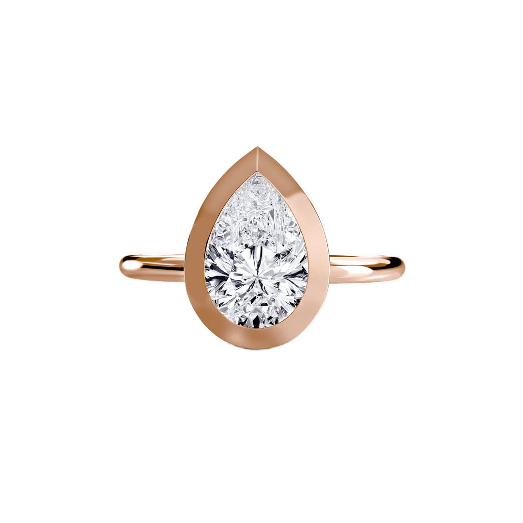 The Bezel Set Solitaire in setting by 18 KARATS