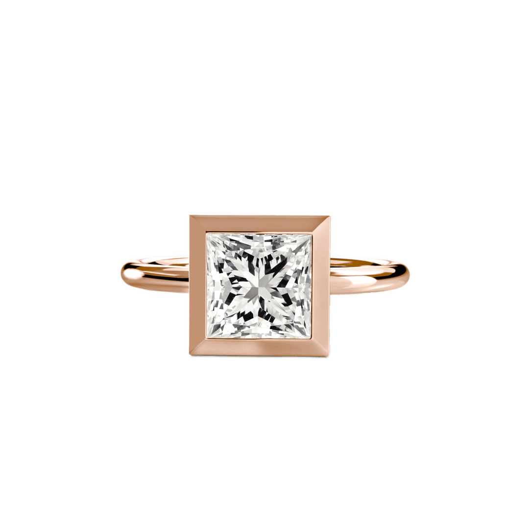 The Bezel Set Solitaire in setting by 18 KARATS