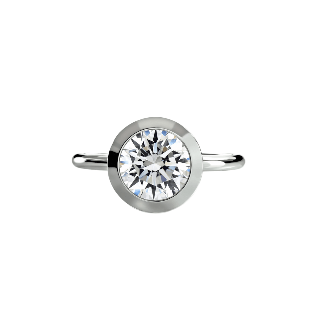 The Bezel Set Solitaire in setting by 18 KARATS