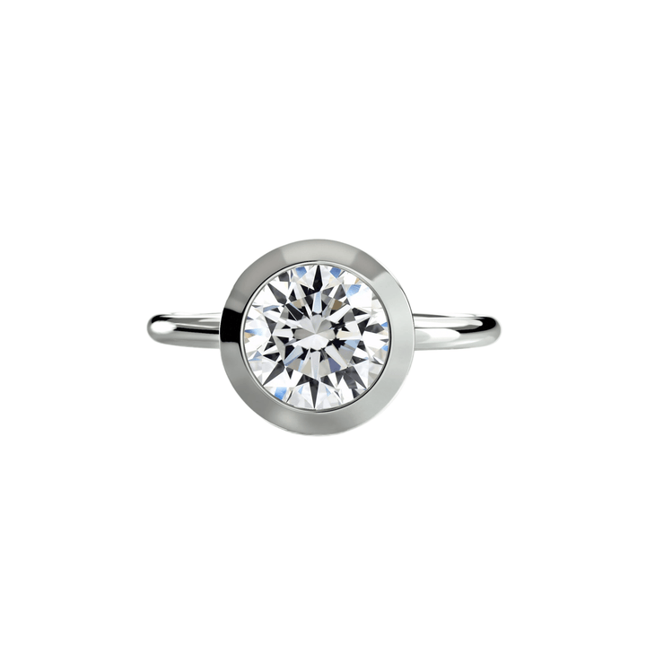 The Bezel Set Solitaire in setting by 18 KARATS