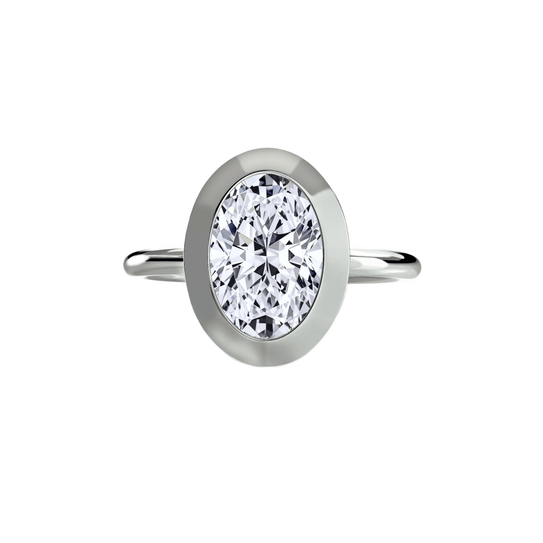 The Bezel Set Solitaire in setting by 18 KARATS