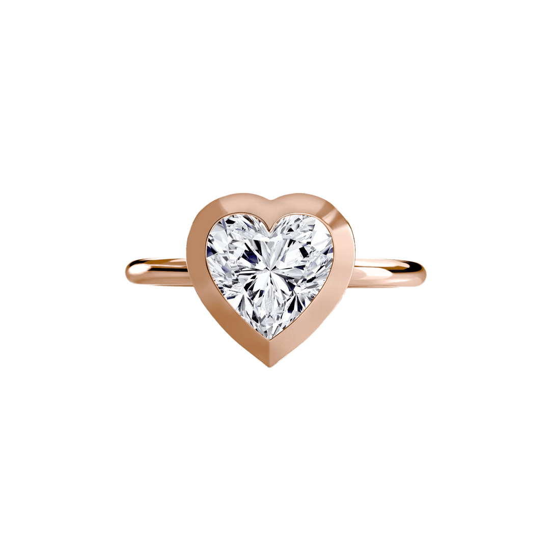 The Bezel Set Solitaire in setting by 18 KARATS