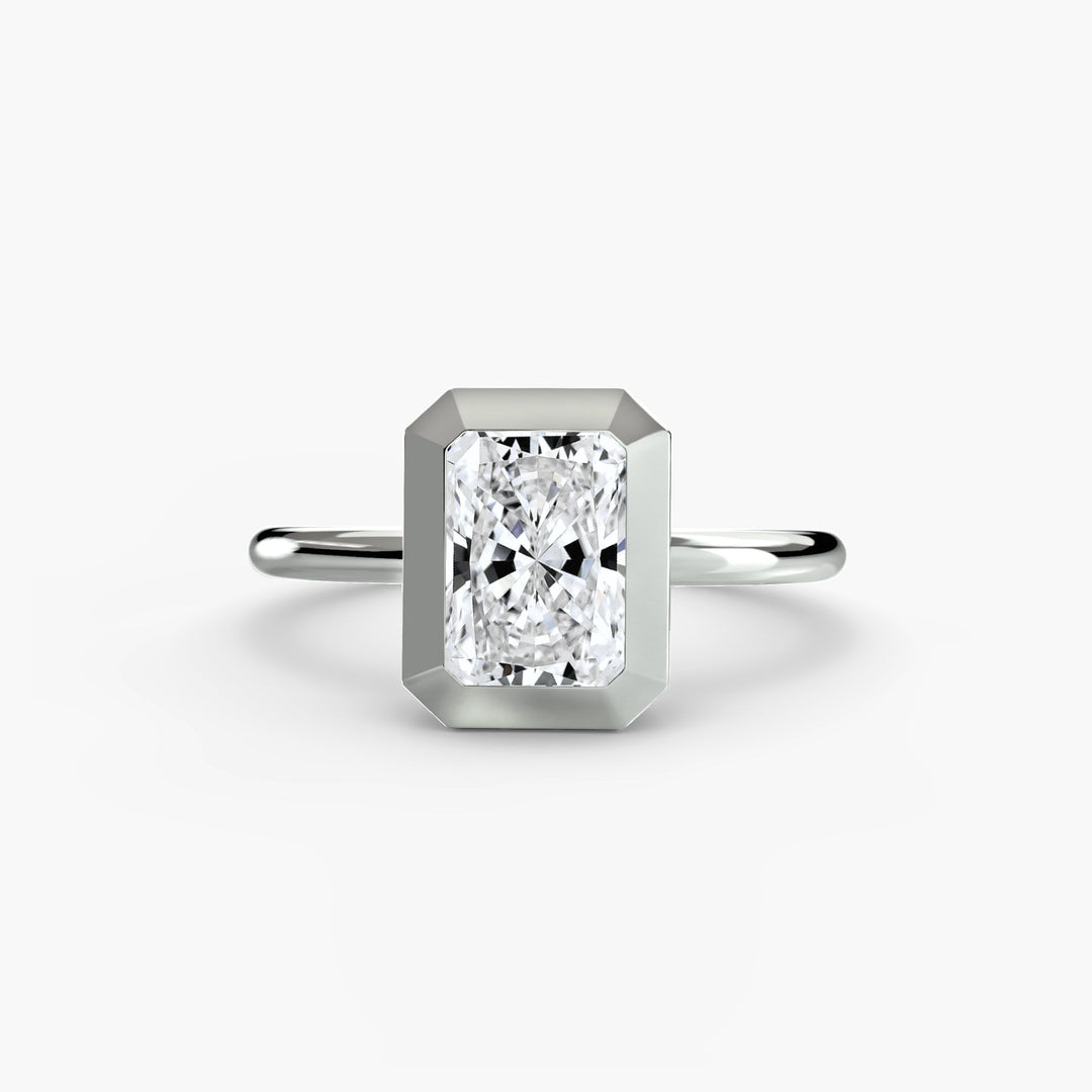 The Bezel Set Solitaire in setting by 18 KARATS