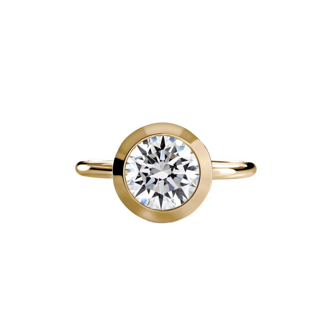 The Bezel Set Solitaire in setting by 18 KARATS