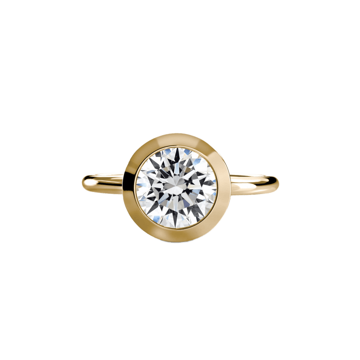 The Bezel Set Solitaire in setting by 18 KARATS
