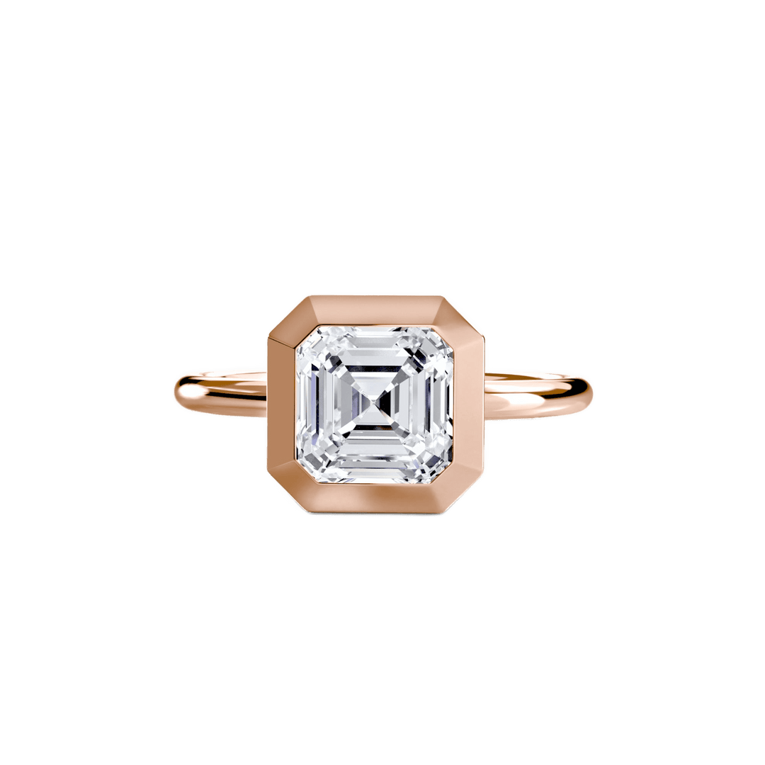 The Bezel Set Solitaire in setting by 18 KARATS