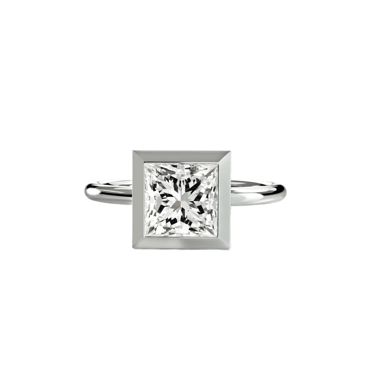 The Bezel Set Solitaire in setting by 18 KARATS
