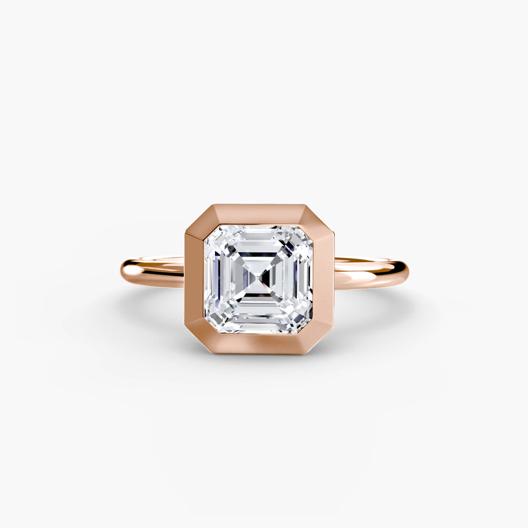 The Bezel Set Solitaire in setting by 18 KARATS