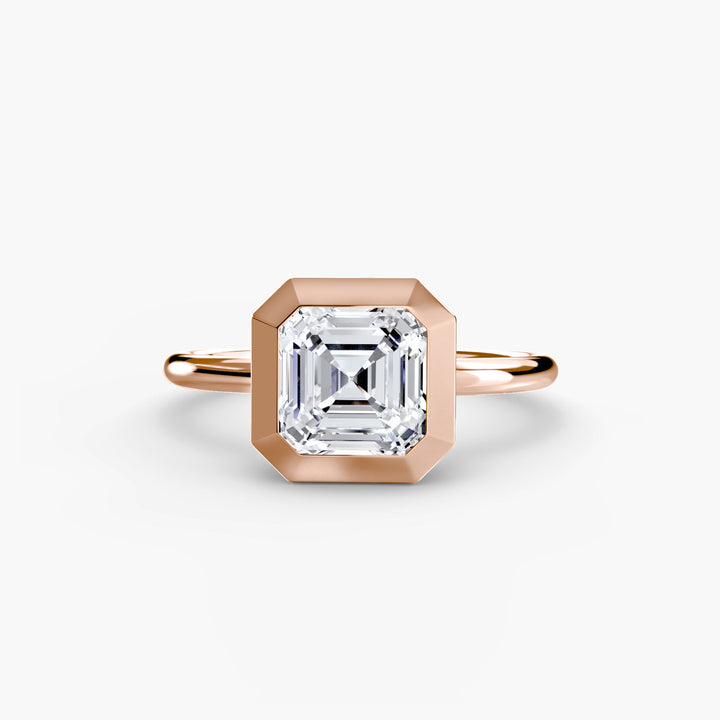 The Bezel Set Solitaire in setting by 18 KARATS