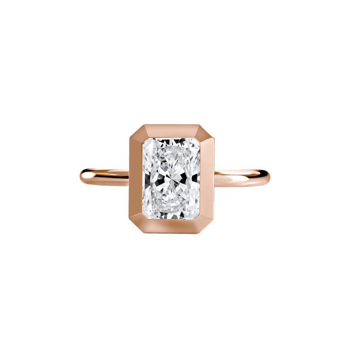 The Bezel Set Solitaire in setting by 18 KARATS