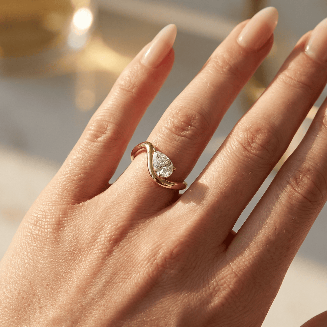 The Embrace Pear Twist Engagement Ring - R1032 in by 18 KARATS