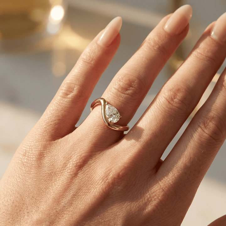 The Embrace Pear Twist Engagement Ring - R1032 in by 18 KARATS