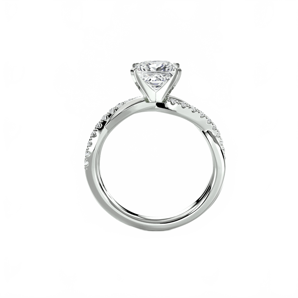 The Emerald Twist Pavé Ring in setting by 18 KARATS