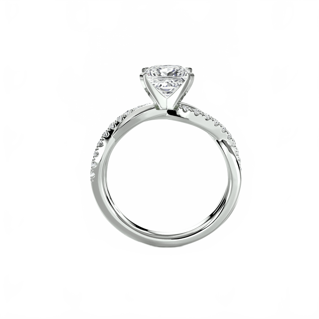 The Emerald Twist Pavé Ring in setting by 18 KARATS