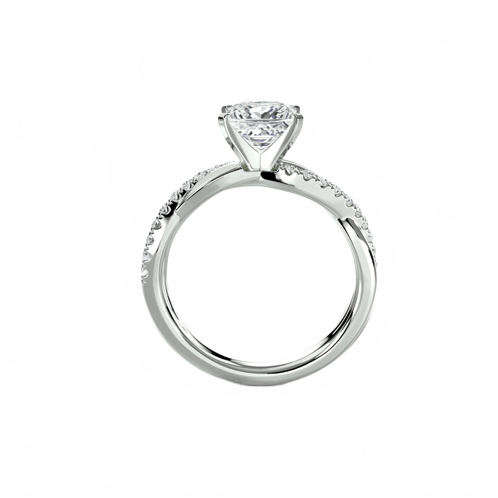 The Emerald Twist Pavé Ring in setting by 18 KARATS